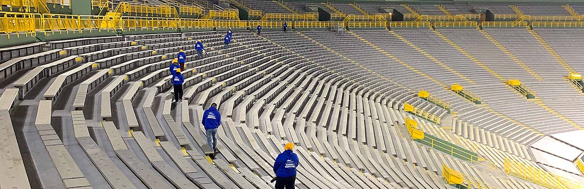 Crew cleaning out the stadium at Lambeau Field blog