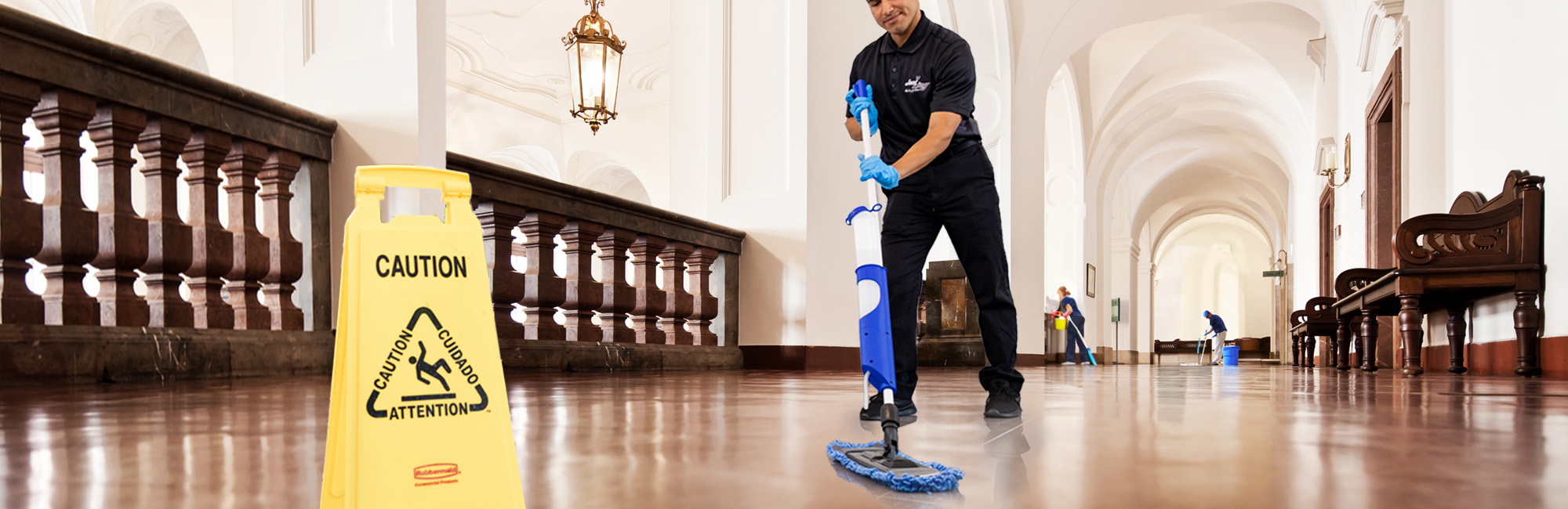 Cleaning crew sweeping and mopping the floors in a government facility building blog